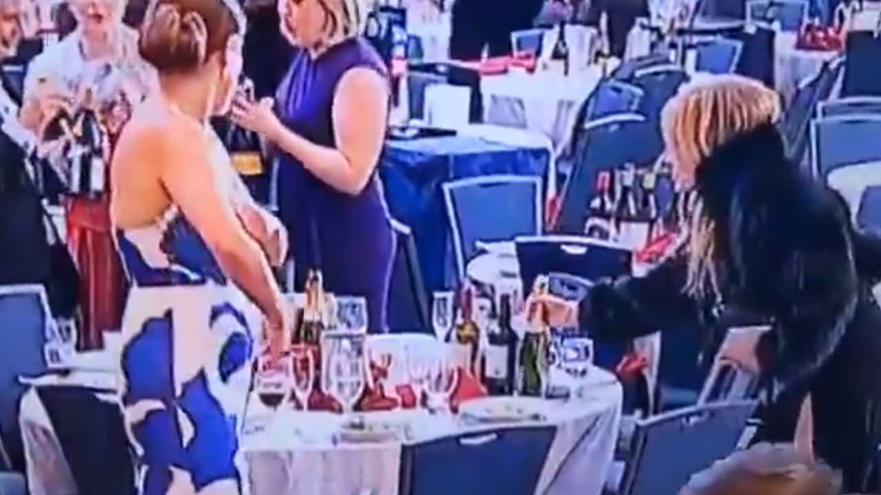 Stealing wine bottles during the chaos.png