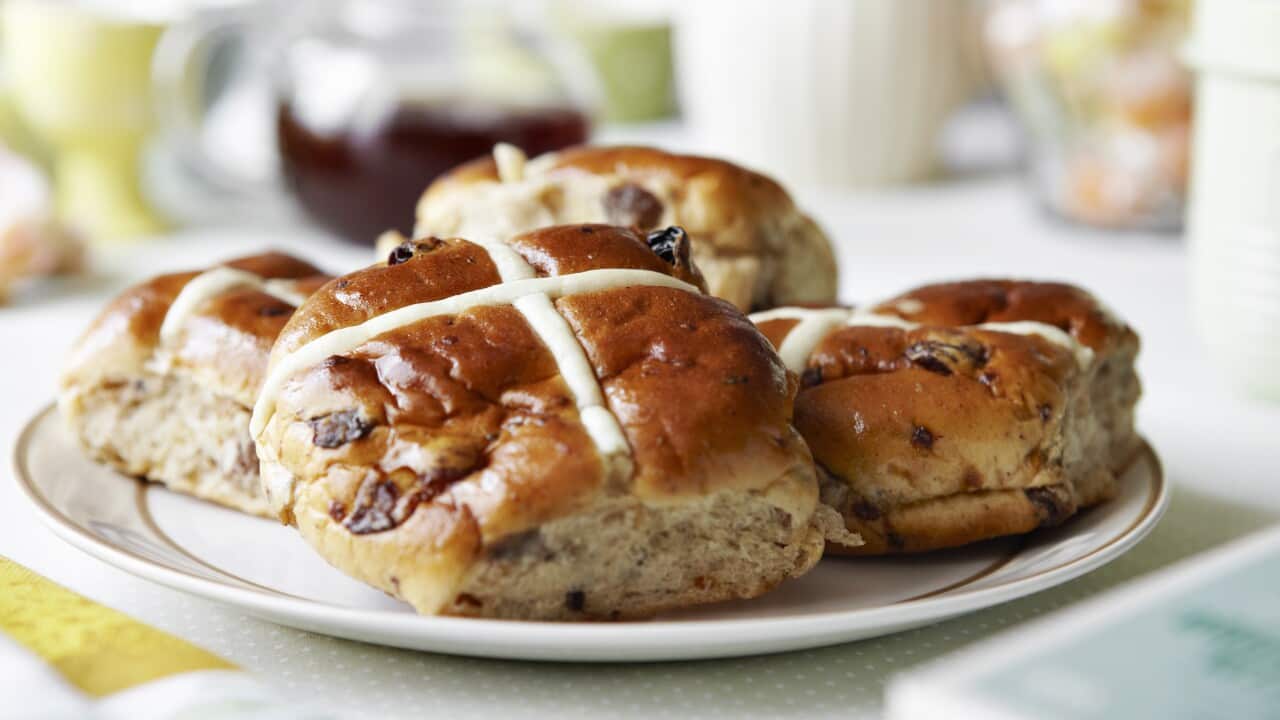 Close up of plate of hot cross buns
