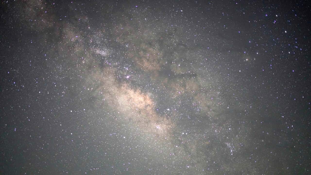 The Milky Way galaxy, a mass of stars and clouds in space.