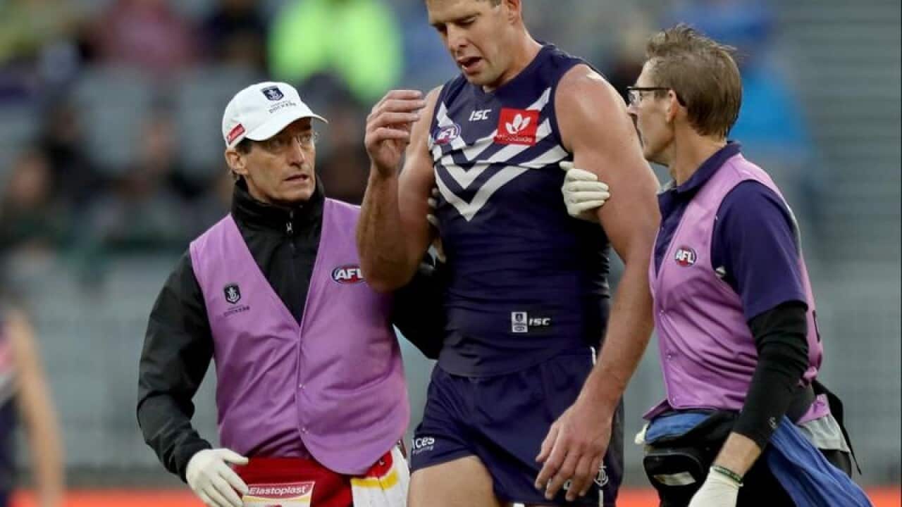 Fremantle Dockers ruckman Aaron Sandilands leaves the field