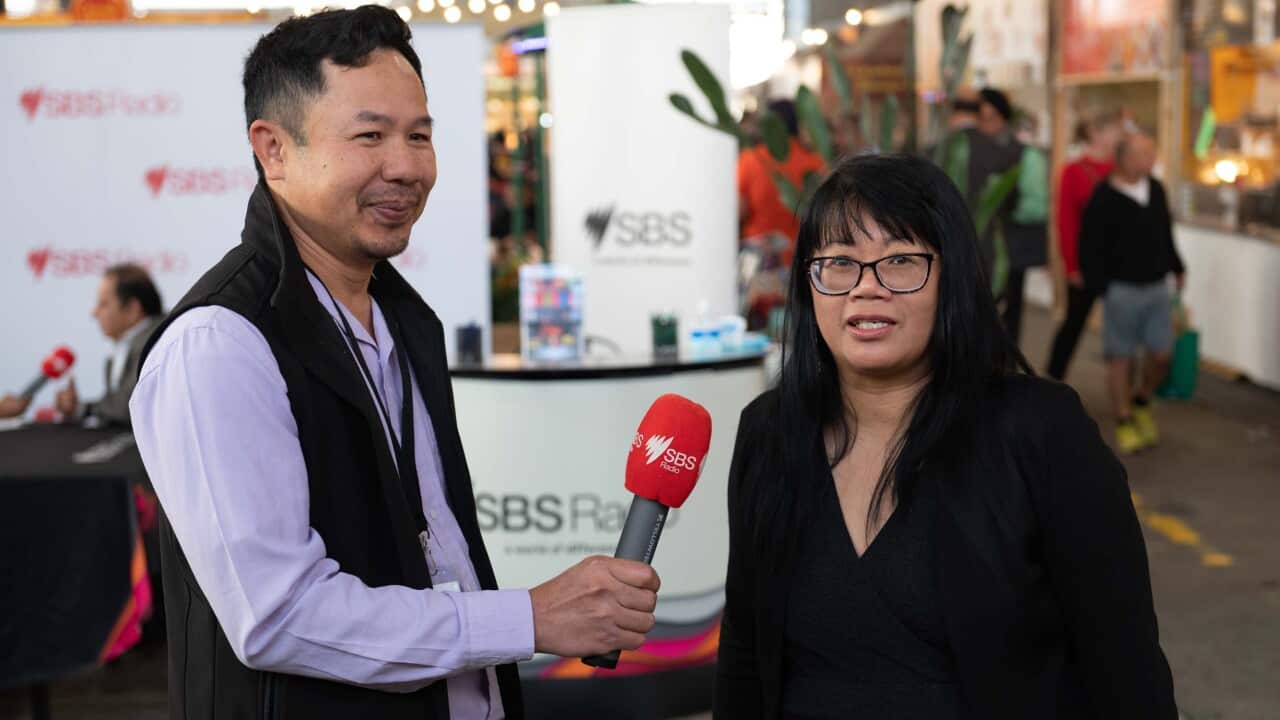 Cambodian business women Sineth Sar provide interview with SBS in Dandenong Market
