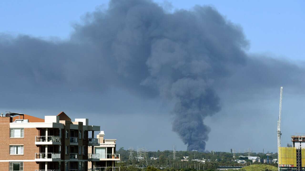 Smoke seen from a fire at a waste recycling centre at Chullora