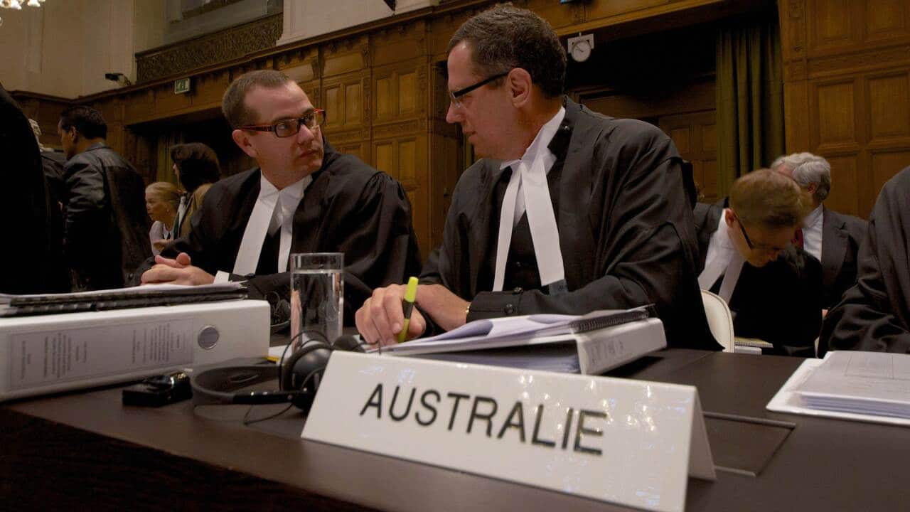 Australian lawyers John Reid (L) and Justin Gleeson in the International Court of Justice - AAP-1.jpg