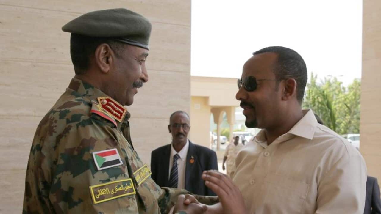 Ethiopian Prime Minister Abi Ahmed (R) and Sudan's Abdelfattah Burhan