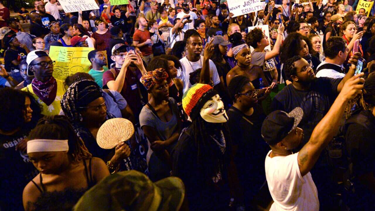 Protesters congregate