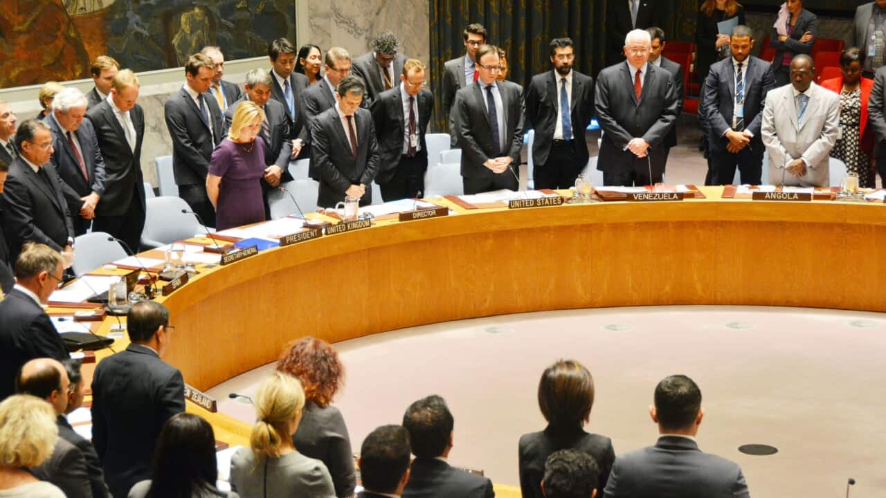 Ambassadors representing member states on the U.N. Security Council observe a moment of silence for those killed in the Nov. 12 suicide bomb attack in Lebanon and Nov. 13 terror attacks in Paris during their meeting in New York.