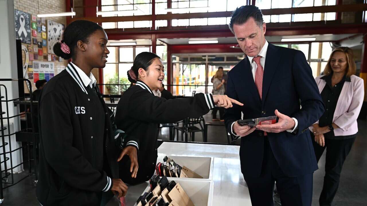 CHRIS MINNS SCHOOL MOBILE PHONES BAN