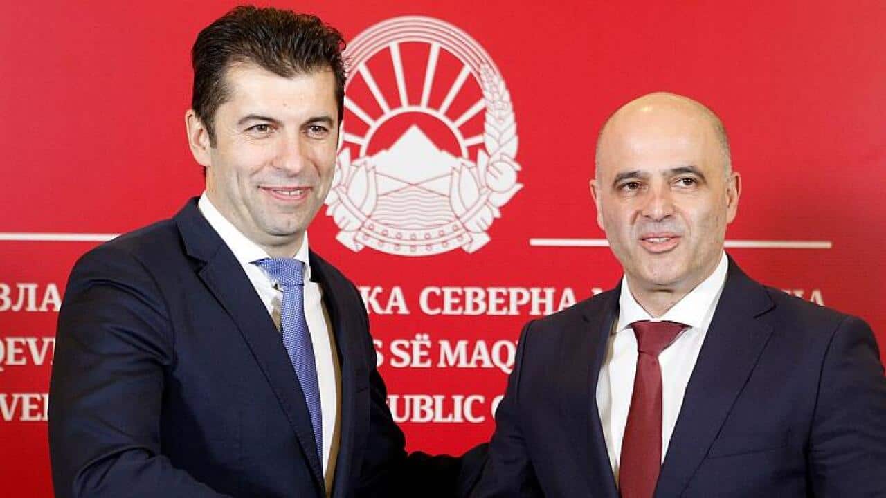 Bulgarian and Macedonian Premiers Kiril Petkov and Dimitar Kovacevski shake hands during a news conference, 18 January 2022.