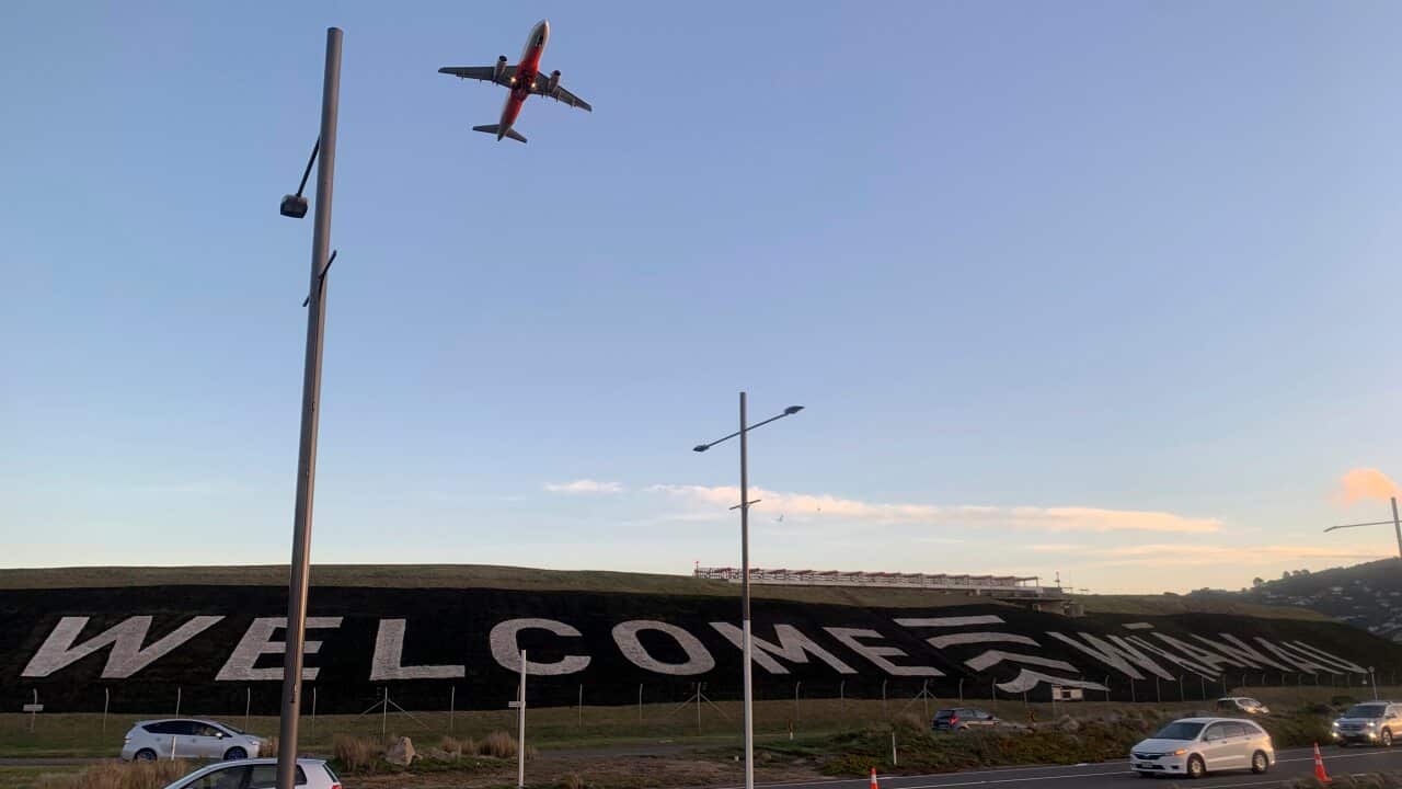 A giant sign painted near the main runway of the Wellington International Airport greets travellers returning home on 19 April 2021.