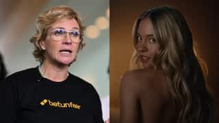 An older woman speaking at a press conference and a younger woman without a shirt on