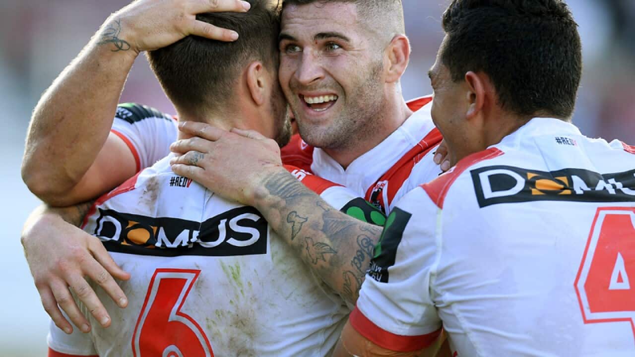Gareth Widdop of the Dragons, (left), celebrates