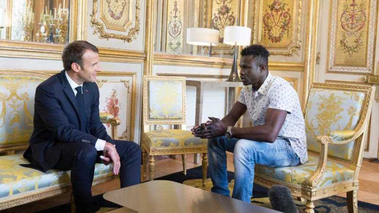 French President Emmanuel Macron receives Mamoudou Gassama, 22, from Mali, at the presidential Elysee Palace in Paris, France on May, 28, 2018