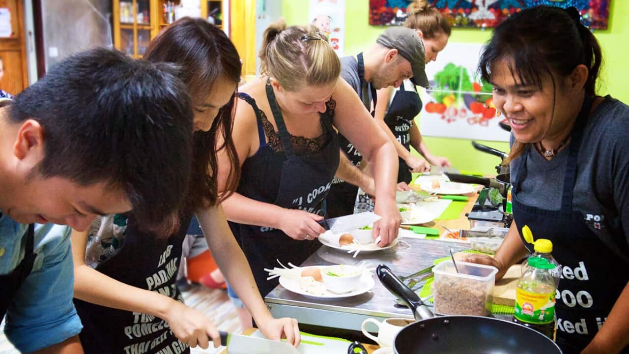 Saiyuud 'Poo' Diwong runs a cooking class