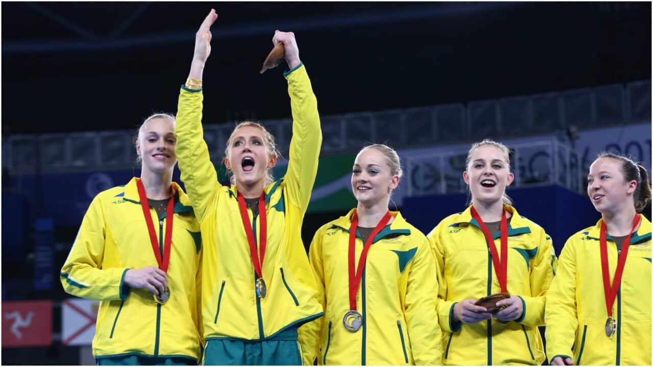 Georgia Rose Brown, Larrissa Miller, Lauren Mitchell, Olivia Vivian and Mary Anne Monckton of Australia celebrate with their silver medals after the Women's Team Event at SECC Precinct during day six of the Glasgow 2014 Commonwealth Games
