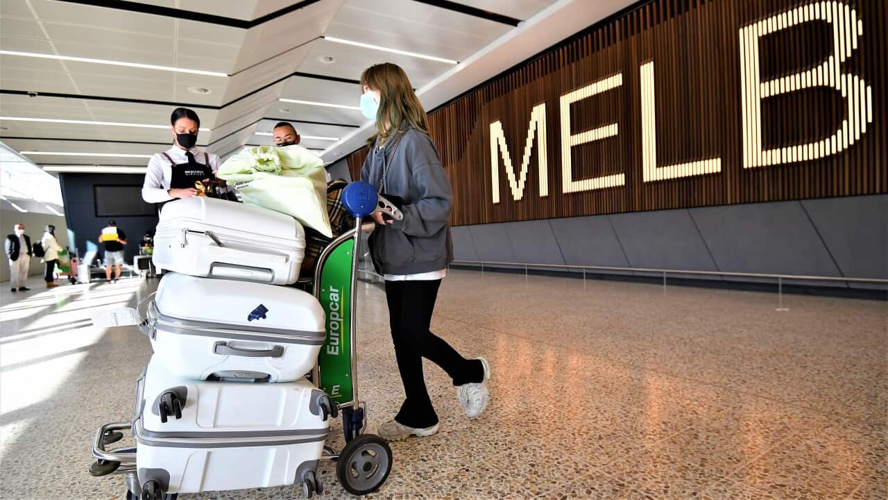 International passengers arrive at Melbourne Airport in Melbourne, Monday, February 21, 2022. Australia’s international borders have reopened without restrictions for fully vaccinated tourists and travellers. (AAP Image/Joel Carrett) NO ARCHIVING