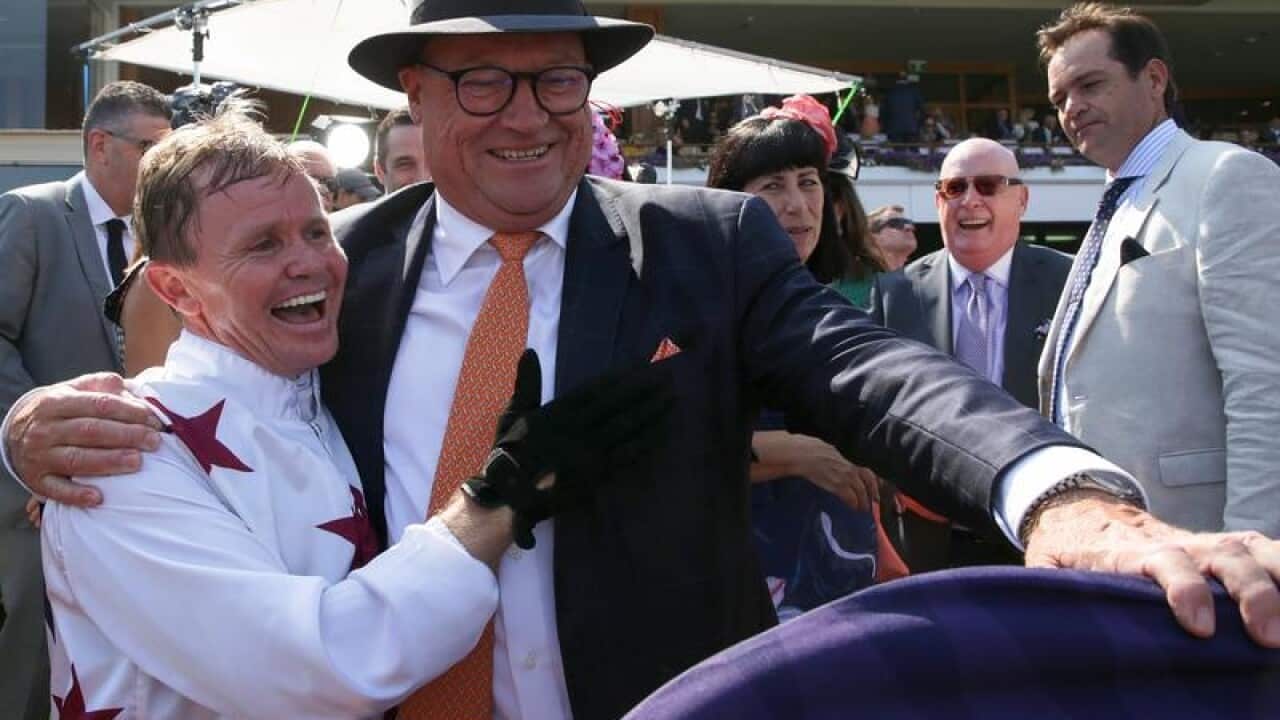 Jockey Barend Vorster with trainer Tony McEvoy