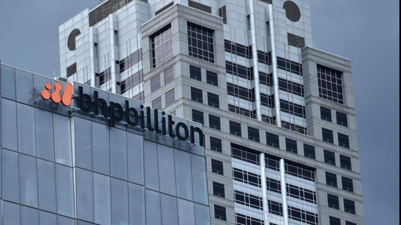 BHP Billiton signage atop a multi-storey building