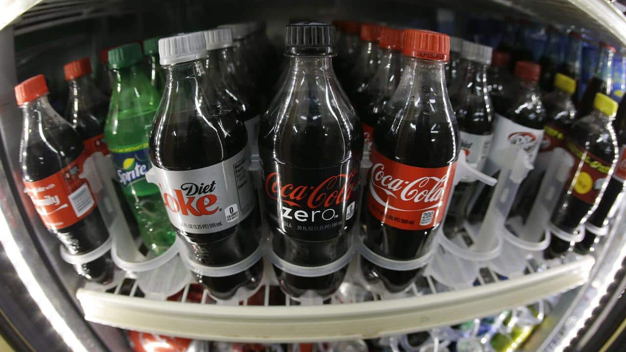 A British organisation has found some fruit juices contain more sugar than cola, while many cans of fizzy drink contain twice the recommended daily sugar limit. (AAP)