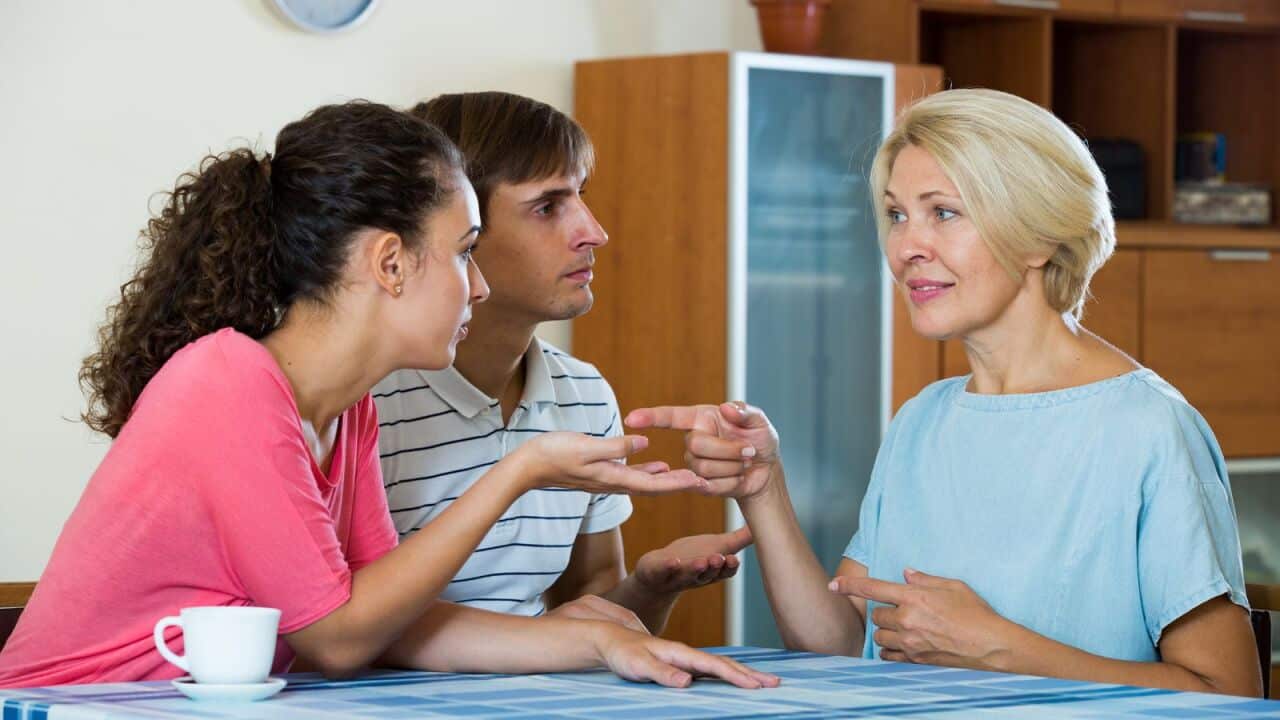 Blonde mother and two adult children