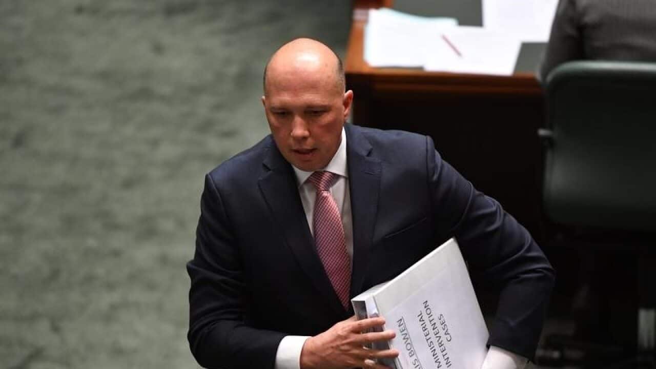 Minister for Home Affairs Peter Dutton leaves after Question Time.