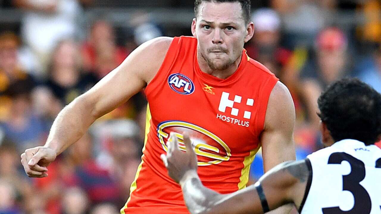 Steven May of the Gold Coast Suns