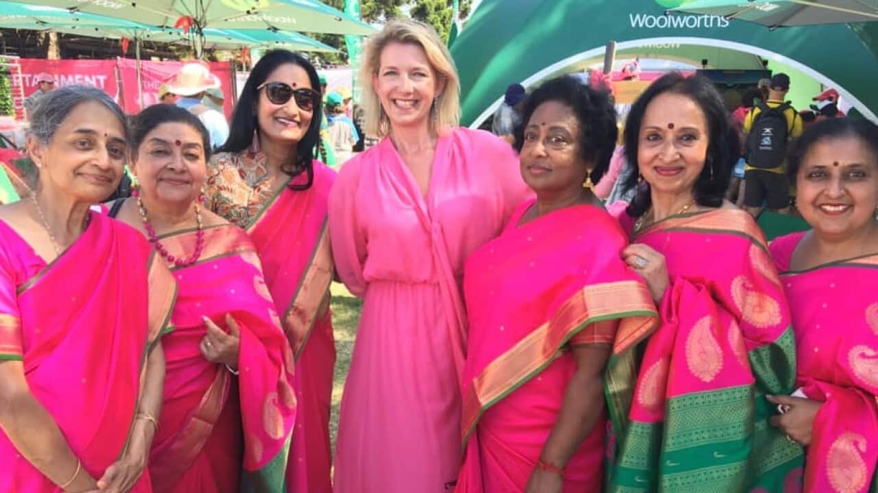 Participants in the day pose with Holly Masters, CEO of the McGrath Foundation.