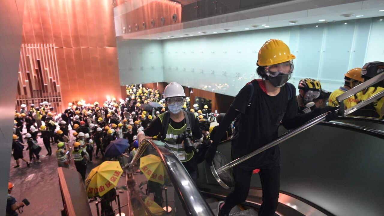 Protesters break into the government headquarters in Hong Kong on July 1.
