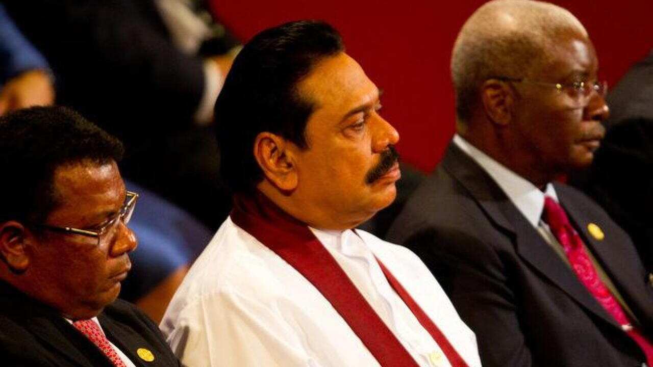 rajapaksa_chogm_111029_aap_B_381117021