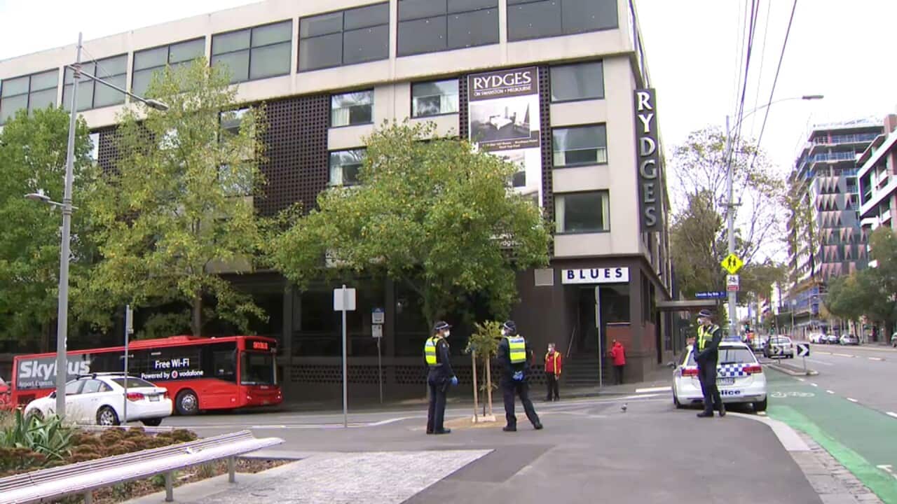 Victorian police officers outside a hotel quarantine facility in Melbourne