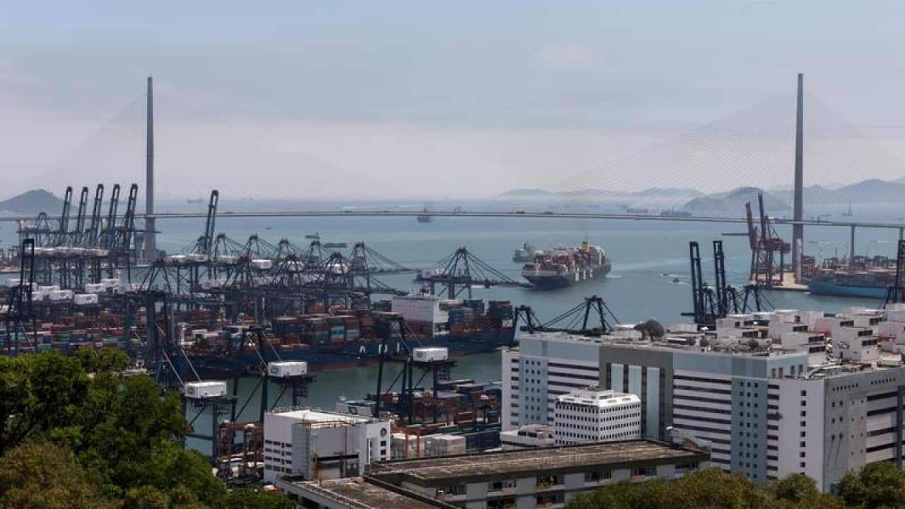 Container ships berthed in Hong Kong