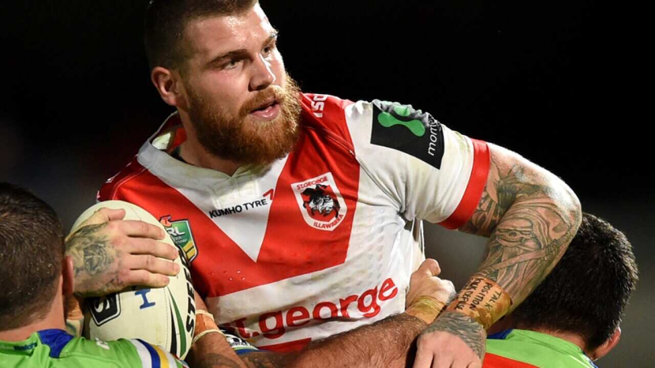 Josh Dugan (centre) of the Dragons