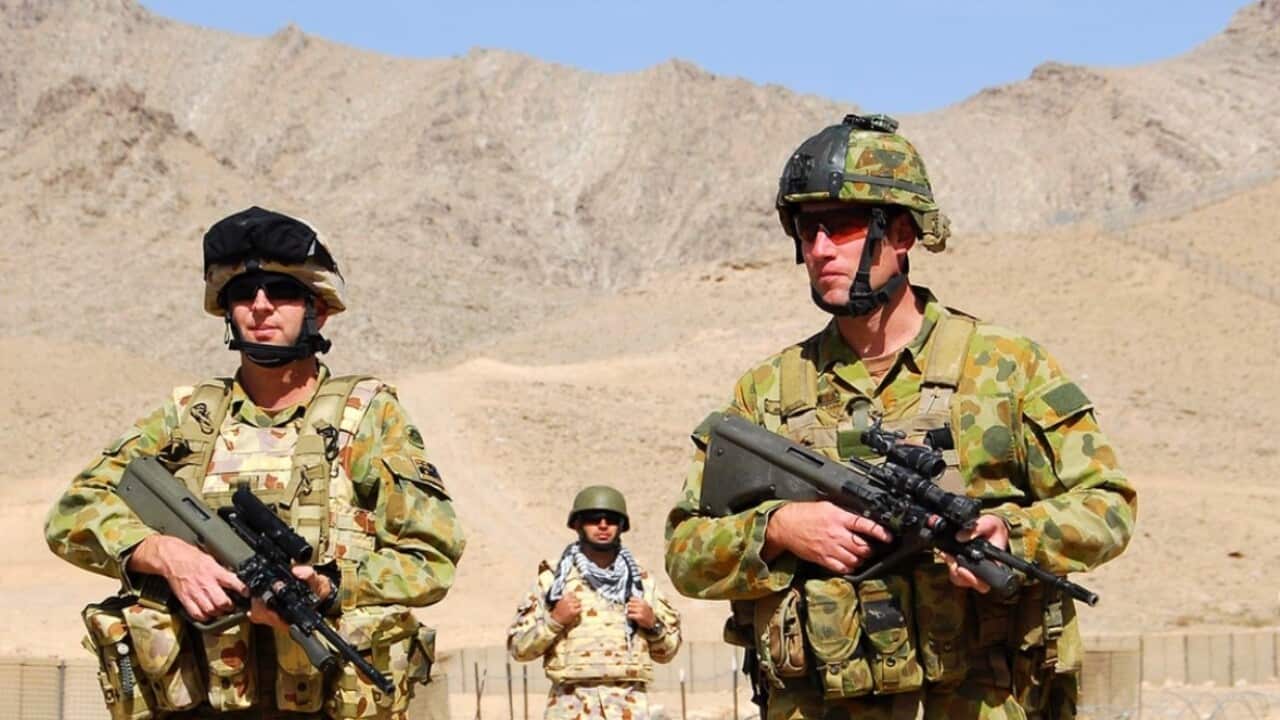 Julian Hohnen, right, on patrol in Afghanistan.