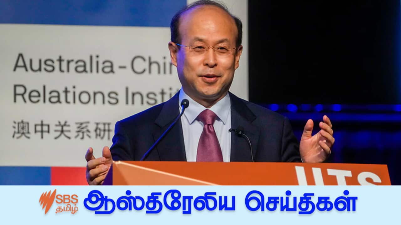 China's Ambassador to Australia, Xiao Qian gestures during his address on the state of relations between Australia and China.