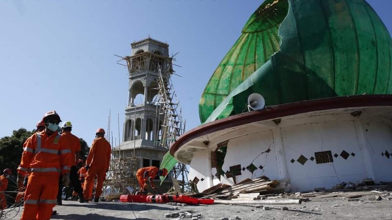 Rescuers look for suvivors