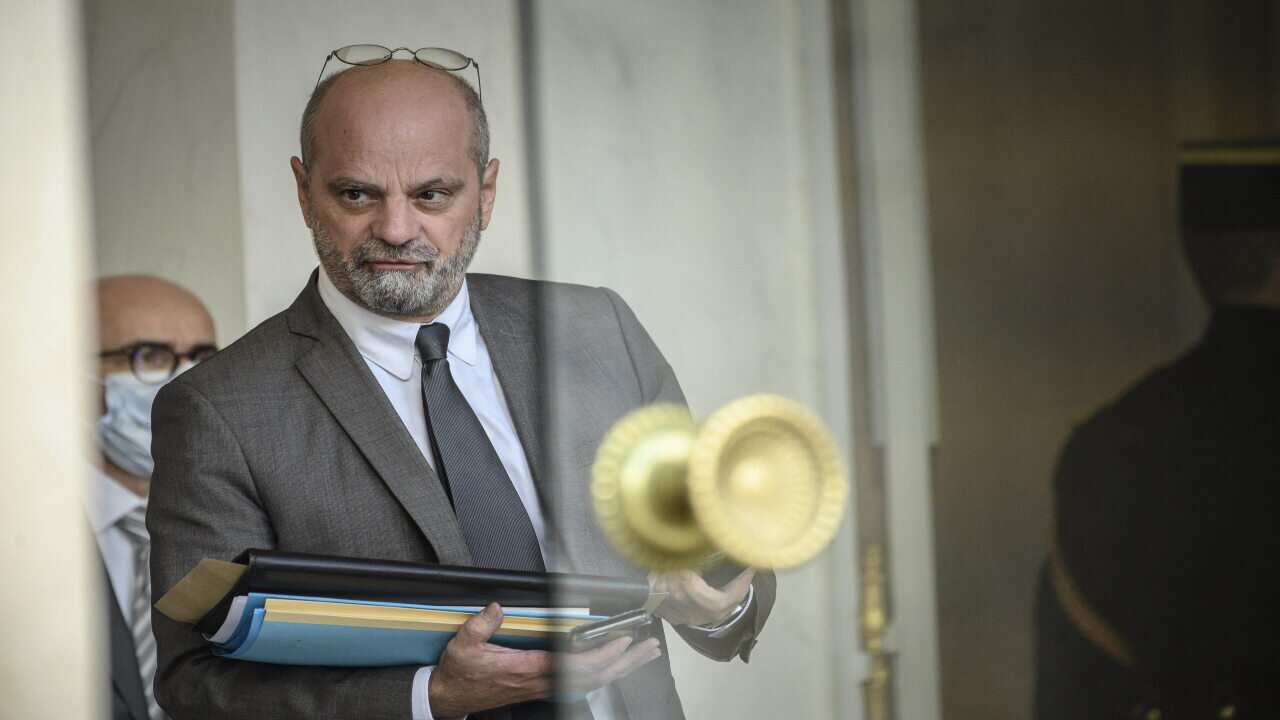 French Education, Youth and Sports Minister Jean-Michel Blanquer speaks on the phone as he leaves the Elysee Presidential Palace after a weekly cabinet meeting on November 3, 2021 in Paris. Photo by ELIOT BLONDET/ABACAPRESS.COM.