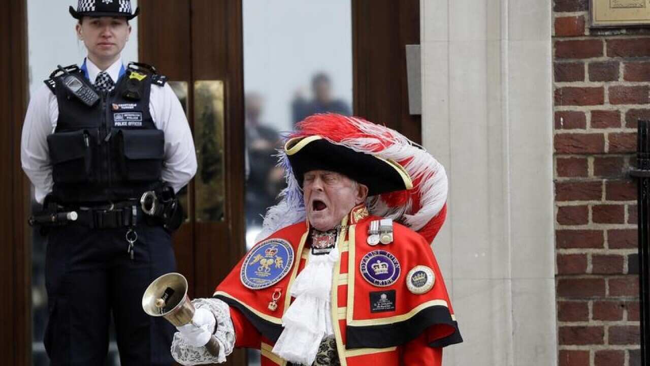 Town Crier Tony Appleton is seen making the announcement.