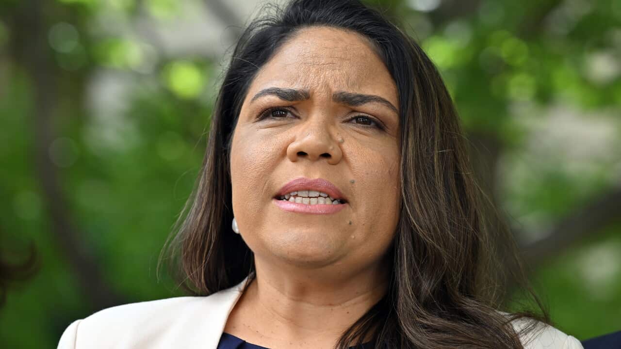 A woman speaking.