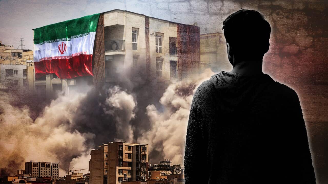 A stylised image of a man's silhouette, facing a building draped in an Iranian flag as plumes of smoke rise from bombed buildings around it.