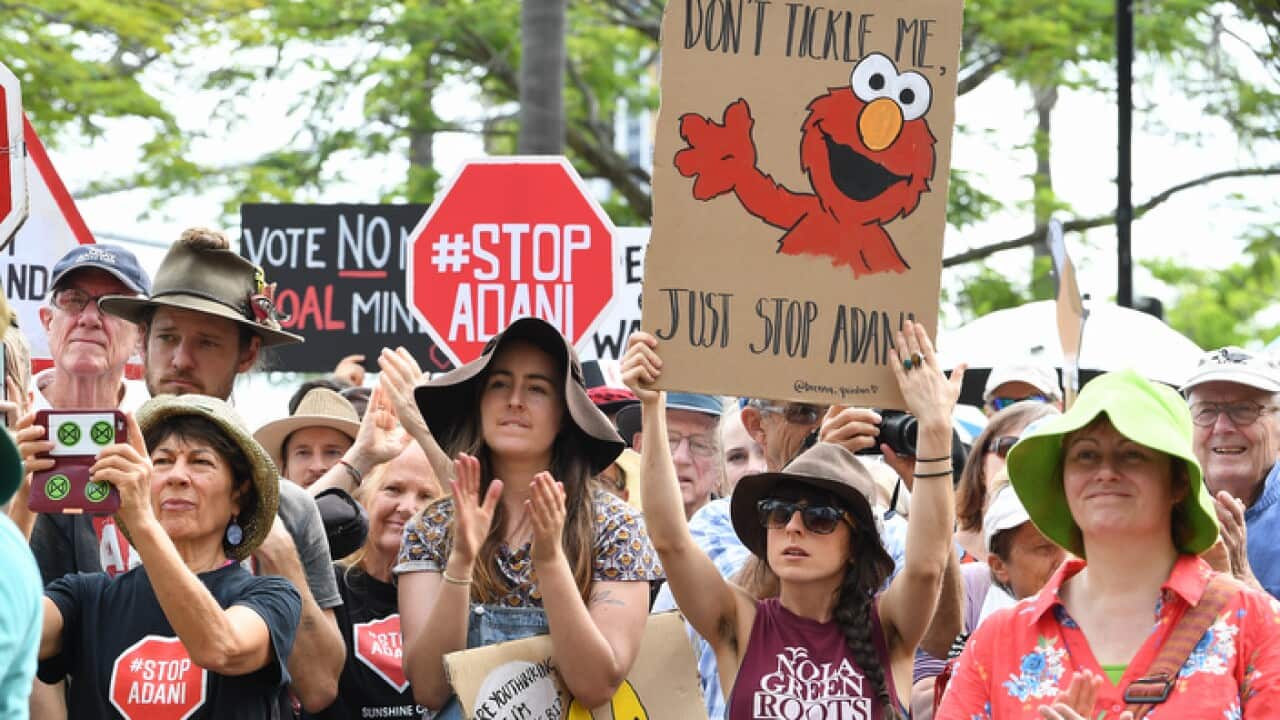 Protestors are seen during a Stop Adani rally in Brisbane