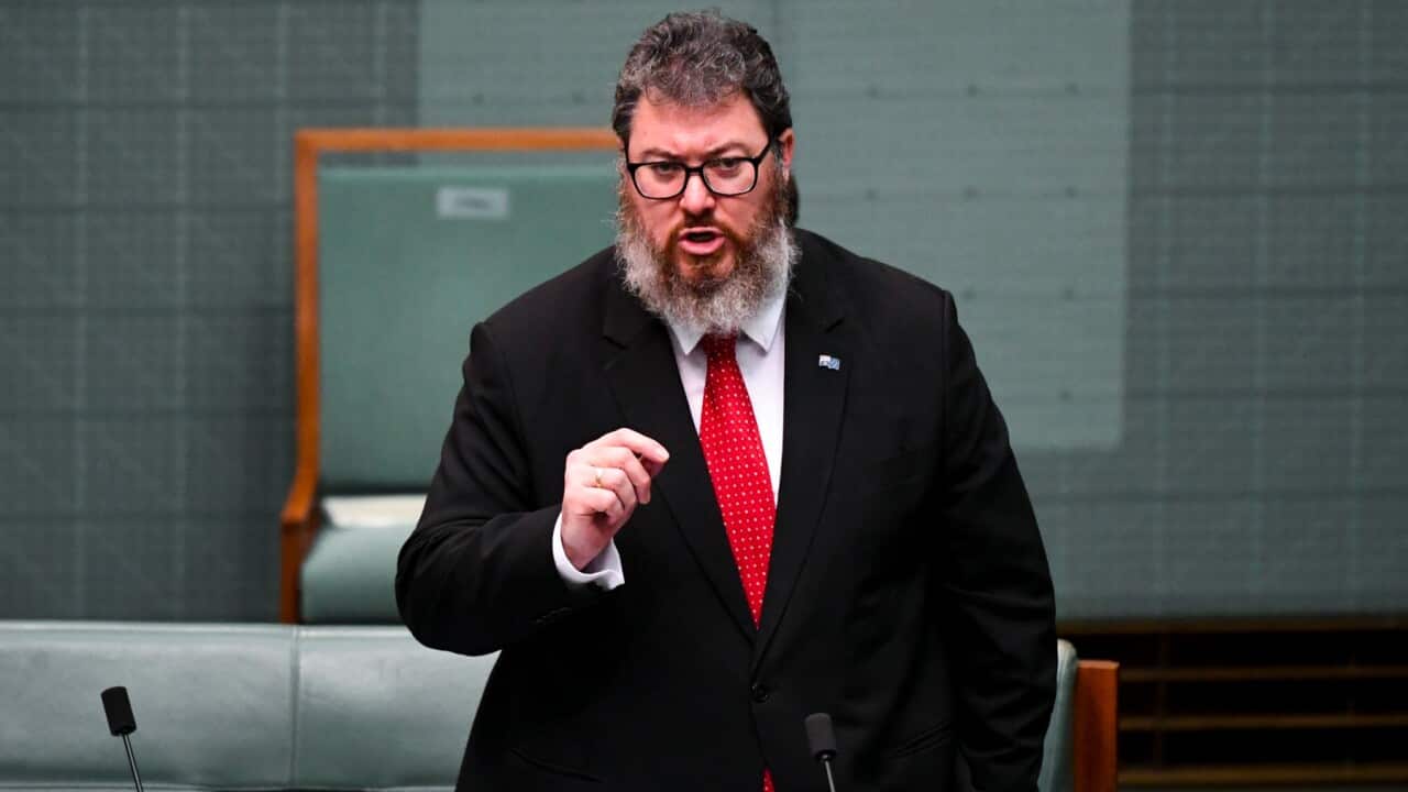 Nationals member for Dawson George Christensen speaks ahead of House of Representatives Question Time at Parliament House in Canberra, Tuesday, March 29, 2022.