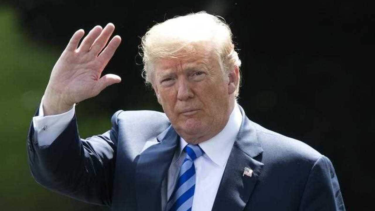 US President Donald J. Trump waves as he walks across the South Lawn of the White House to depart by Marine One, in Washington, DC, USA, 01 June 2018.