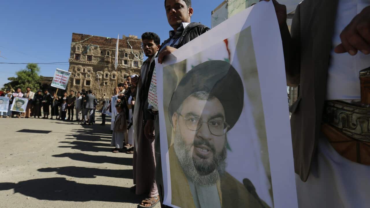 men holding posters, Yemen