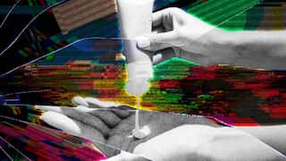 A broken and glitched screen is layered on top of a black and white photograph showing a person applying sunscreen to their hand.