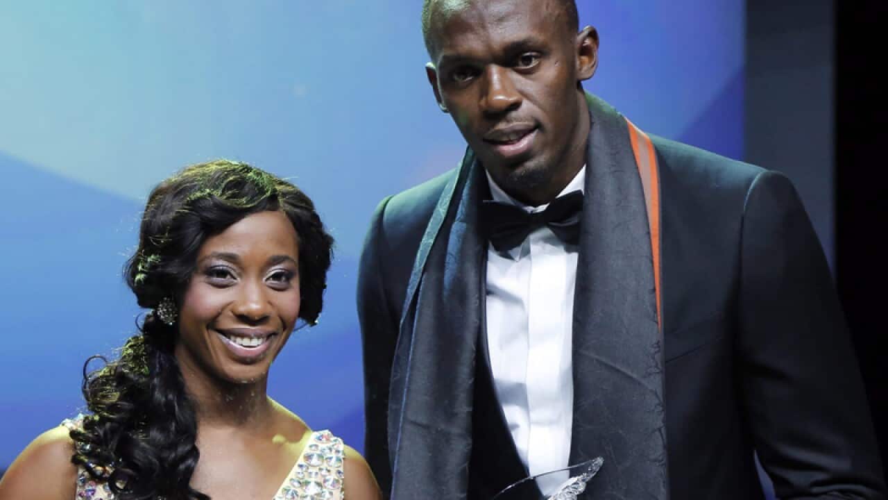 Jamaican sprinters Shelly-Ann Fraser-Pryce (L) and Usain Bolt (R)