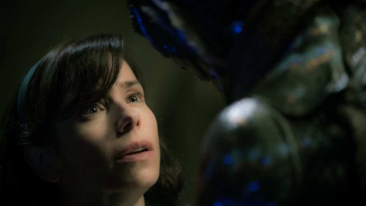 Sally Hawkins and Doug Jones in the film THE SHAPE OF WATER.