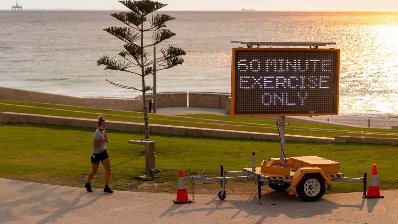 A sign stating '60 minutes exercise only' is seen at Scarborough Beach in Perth, Monday, 1 February, 2021.