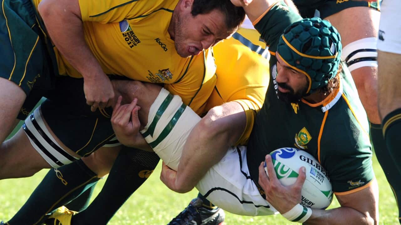 Former Springbok Victor Matfield (R)