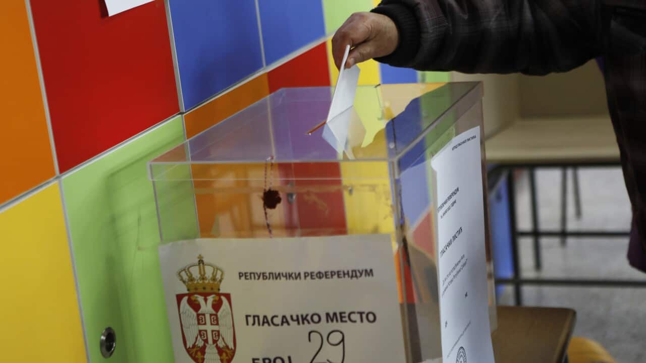A man casts a ballot during the referendum on constitutional changes in Belgrade, Serbia, 16 January 2022.