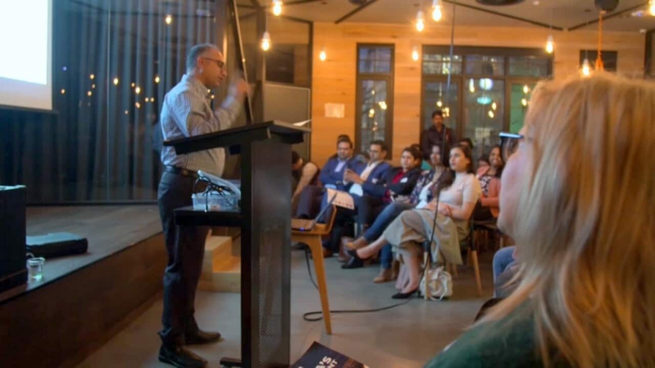 Melbourne's migrant employment 'shark tank' meeting in progress (SBS)