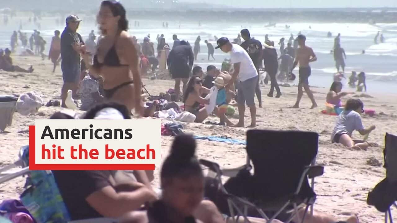 Americans hit the beach on Labor Day weekend, despite COVID-19
